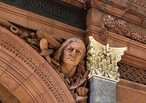 Terra cotta sculpture at the entrance to the Brooklyn Historical Society building, New York City